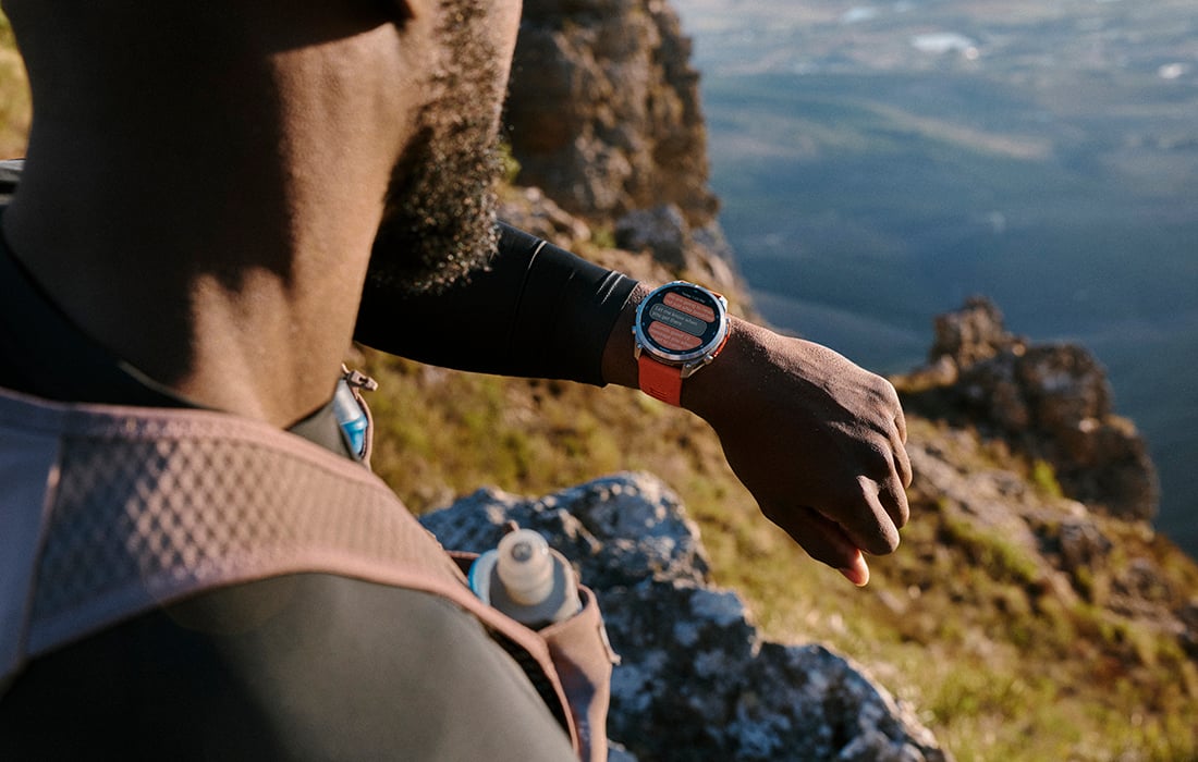 A collage of red, green and white patterns with "give a garmin" in the middle.