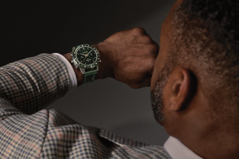 The following Garmin watches are depicted from left to right on a blue background: Approach S70, Forerunner 970, fēnix 8 Pro, Venu 4 and Lily 2 Active.